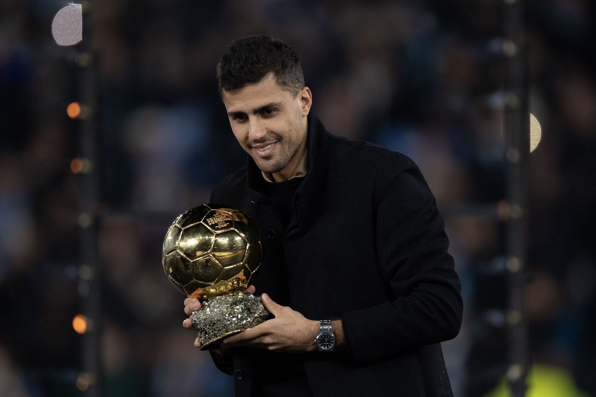 Rodri with the Ballon d'Or trophy